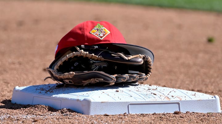 Feb 21, 2026: The glove and hat of Cleveland Guardians third baseman Daniel Schneemann (10) rests on the base against the Milwaukee Brewers at American Family Fields of Phoenix. Mandatory 