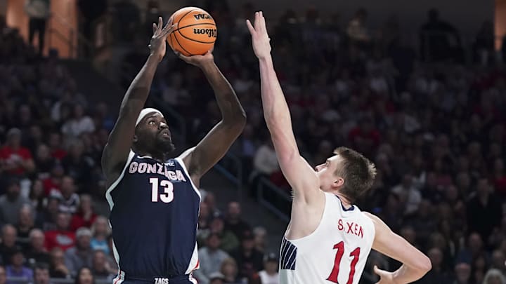 March 12, 2024; Las Vegas, NV, USA; Gonzaga Bulldogs forward Graham Ike (13) shoots the basketball against Saint Mary's Gaels center Mitchell Saxen (11) during the second half in the finals of the WCC Basketball Championship at Orleans Arena.