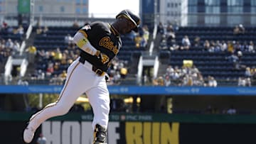 Pittsburgh Pirates designated hitter Andrew McCutchen (22) circles the bases on a solo home run against the Washington Nationals during the third inning at PNC Park. 