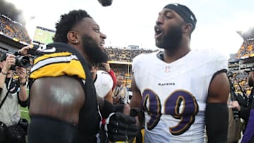 Nov 17, 2024; Pittsburgh, Pennsylvania, USA;  Pittsburgh Steelers linebacker Patrick Queen (6) and Baltimore Ravens linebacker Odafe Oweh (99) shake hands at mid-field after playing at Acrisure Stadium. Mandatory Credit: Charles LeClaire-Imagn Images