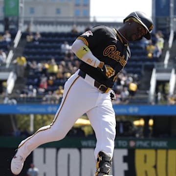 Pittsburgh Pirates designated hitter Andrew McCutchen (22) circles the bases on a solo home run against the Washington Nationals during the third inning at PNC Park. 