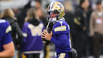 Nov 29, 2025; Seattle, Washington, USA; Washington Huskies quarterback Demond Williams Jr. (2) during warmup before the game against the Oregon Ducks at Husky Stadium. Mandatory Credit: Steven Bisig-Imagn Images