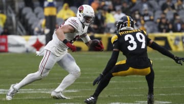 Dec 3, 2023; Pittsburgh, Pennsylvania, USA; Arizona Cardinals tight end Trey McBride (85) runs after a catch as Pittsburgh Steelers safety Minkah Fitzpatrick (39) defends during the second quarter at Acrisure Stadium. Mandatory Credit: Charles LeClaire-USA TODAY Sports