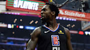 April 21, 2019; Los Angeles, CA, USA; Los Angeles Clippers guard Patrick Beverley (21) reacts after blocking a shot against Golden State Warriors forward Draymond Green (23) during the first half in game four of the first round of the 2019 NBA Playoffs at Staples Center. Mandatory Credit: Gary A. Vasquez-Imagn Images