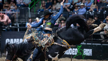 Isaac Diaz, of Desdemona, Texas, rides Watch Levi during the saddle bronc riding portion of the annual Buc Days Rodeo in American Bank Center in Corpus Christi, Texas, on May 9, 2025.