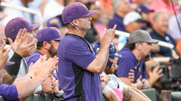 Jun 19, 2023; Omaha, NE, USA;  LSU Tigers head coach Jay Johnson watches action against the Wake Forest Demon Deacons in the ninth inning at Charles Schwab Field Omaha. Mandatory Credit: Steven Branscombe-Imagn Images