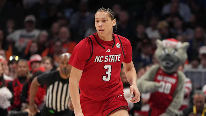 Mar 12, 2026; Charlotte, NC, USA; NC State Wolfpack guard Matt Able (3) brings the ball up the court in the first half at Spectrum Center. Mandatory Credit: Bob Donnan-Imagn Images