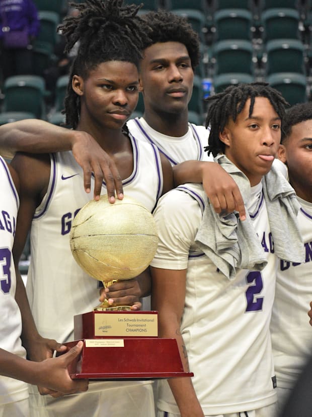 Gonzaga College poses with the 2024 Les Schwab Invitational trophy.