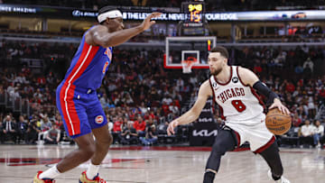 Apr 9, 2023; Chicago, Illinois, USA; Chicago Bulls guard Zach LaVine (8) drives to the basket against Jalen Duren of the Detroit Pistons