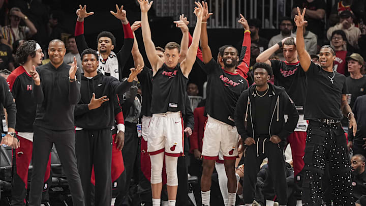 Apr 18, 2025; Atlanta, Georgia, USA; The Miami Heat bench react against the Atlanta Hawks during overtime at State Farm Arena. Mandatory Credit: Dale Zanine-Imagn Images