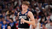 Dec 2, 2025; Lawrence, Kansas, USA; UConn Huskies guard Braylon Mullins (24) celebrates after scoring against the Kansas Jayhawks during the first half of the game at Allen Fieldhouse. Mandatory Credit: Denny Medley-Imagn Images