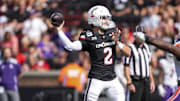 Sep 13, 2025; Cincinnati, Ohio, USA;  Cincinnati Bearcats quarterback Brendan Sorsby (2) throws a pass for a touchdown against the Northwestern State Demons in the first half at Nippert Stadium. Mandatory Credit: Aaron Doster-Imagn Images
