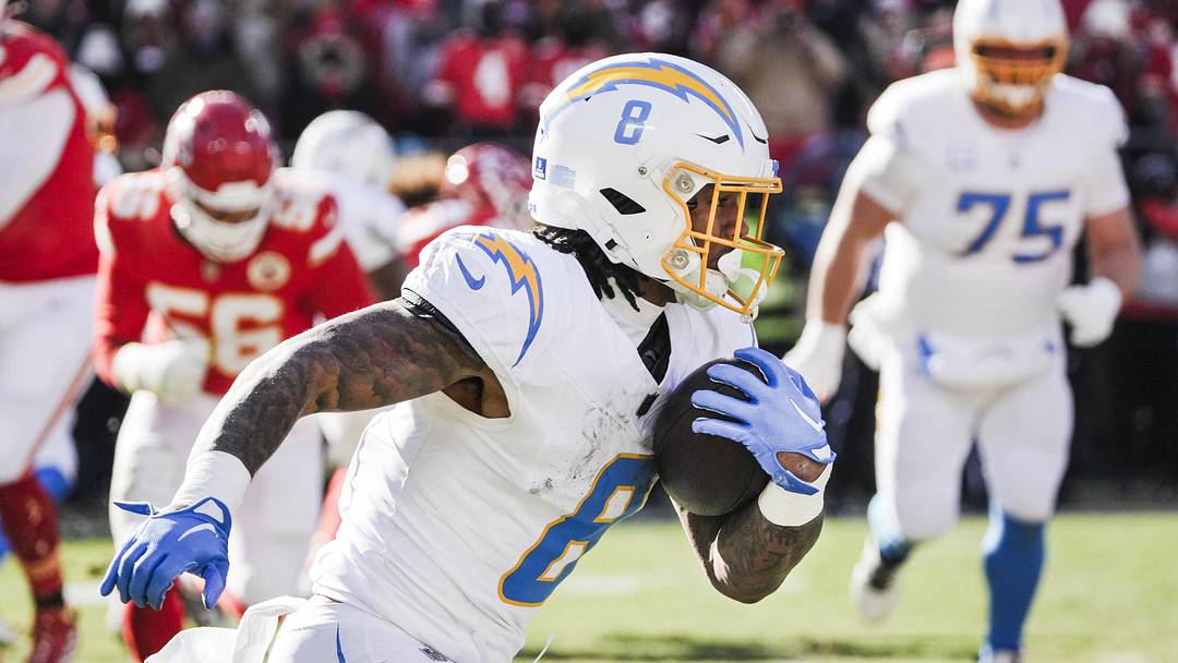 Dec 14, 2025; Kansas City, Missouri, USA; Los Angeles Chargers running back Omarion Hampton (8) runs for yards after the catch against the Kansas City Chiefs during the second quarter at GEHA Field at Arrowhead Stadium. Mandatory Credit: Denny Medley-Imagn Images Dec 14, 2025; Kansas City, Missouri, USA; Los Angeles Chargers running back Omarion Hampton (8) runs for yards after the catch against the Kansas City Chiefs during the second quarter at GEHA Field at Arrowhead Stadium. Mandatory Credit: Denny Medley-Imagn Images