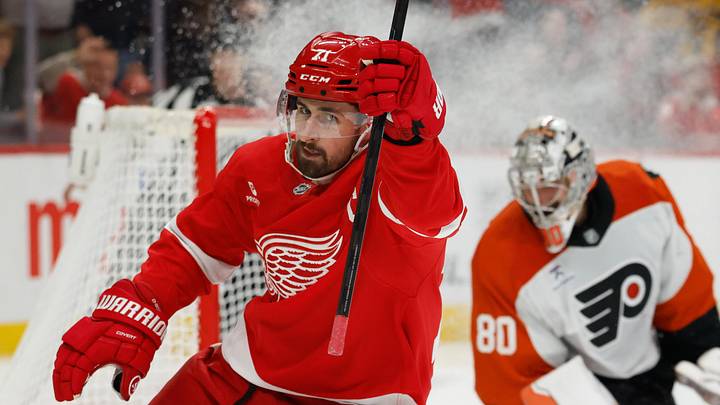 Mar 28, 2026; Detroit, Michigan, USA;  Detroit Red Wings center Dylan Larkin (71) celebrates after scoring on Philadelphia Flyers goaltender Dan Vladar (80) in the second period at Little Caesars Arena.