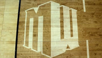 Mar 7, 2020; Las Vegas, Nevada, USA; A detailed view of the Mountain West logo on the baseline seen before the Conference tournament final between the San Diego State Aztecs and the Utah State Aggies at Thomas and Mack Center. Mandatory Credit: Orlando Ramirez-Imagn Images