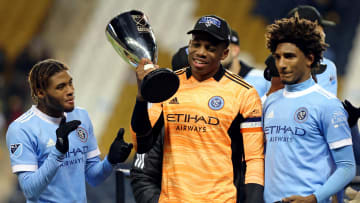 Sean Johnson had the honor of lifting NYCFC's first-ever piece of silverware on Sunday.