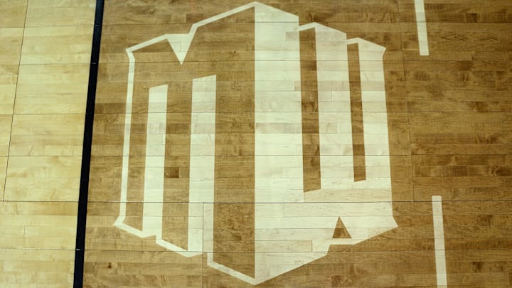 Mar 7, 2020; Las Vegas, Nevada, USA; A detailed view of the Mountain West logo on the baseline seen before the Conference tournament final between the San Diego State Aztecs and the Utah State Aggies at Thomas and Mack Center. Mandatory Credit: Orlando Ramirez-Imagn Images Mar 7, 2020; Las Vegas, Nevada, USA; A detailed view of the Mountain West logo on the baseline seen before the Conference tournament final between the San Diego State Aztecs and the Utah State Aggies at Thomas and Mack Center. Mandatory Credit: Orlando Ramirez-Imagn Images