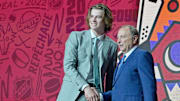 Jul 7, 2022; Montreal, Quebec, CANADA; Conor Geekie shakes hands with NHL commissioner Gary Bettman after being selected as the number eleven overall pick to the Arizona Coyotes in the first round of the 2022 NHL Draft at Bell Centre. Mandatory Credit: Eric Bolte-Imagn Images