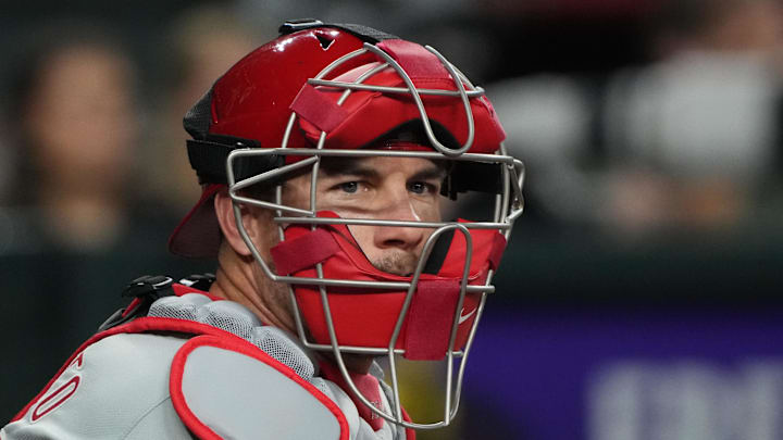 Aug 9, 2024; Phoenix, Arizona, USA; Philadelphia Phillies catcher J.T. Realmuto (10) looks for a sign against the Arizona Diamondbacks in the first inning at Chase Field