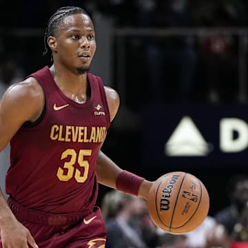 Oct 10, 2023; Atlanta, Georgia, USA; Cleveland Cavaliers forward Isaac Okoro (35) brings the ball up the court against the Atlanta Hawks during the second half at State Farm Arena. Mandatory Credit: Dale Zanine-Imagn Images