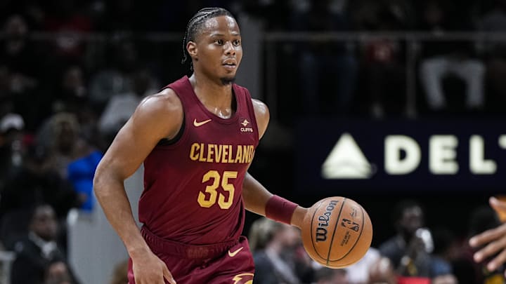 Oct 10, 2023; Atlanta, Georgia, USA; Cleveland Cavaliers forward Isaac Okoro (35) brings the ball up the court against the Atlanta Hawks during the second half at State Farm Arena. Mandatory Credit: Dale Zanine-Imagn Images