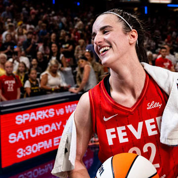 Indiana Fever guard Caitlin Clark (22) smiles in an interview