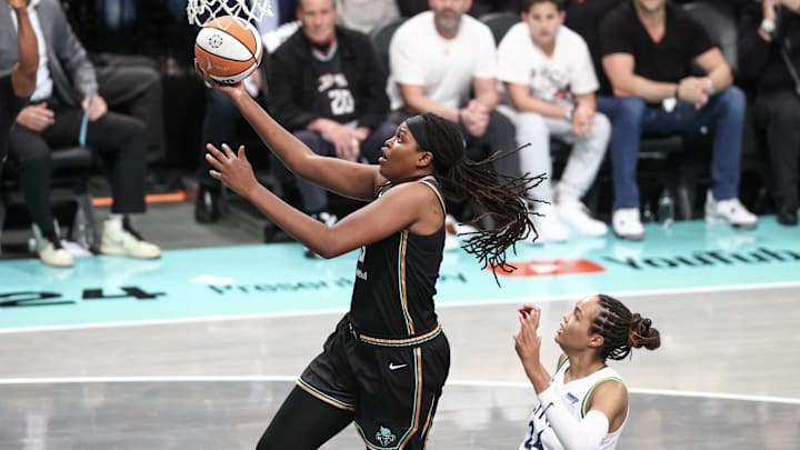 New York Liberty forward Jonquel Jones (35) drives.