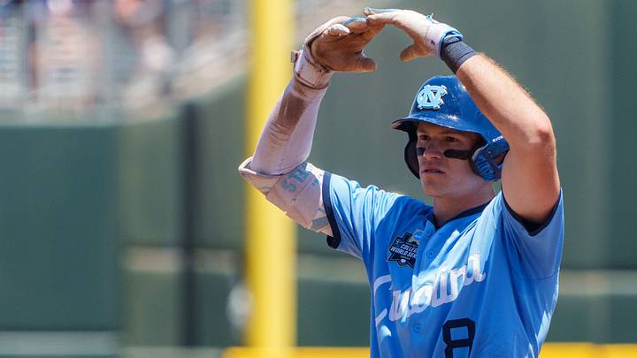 Jun 17, 2026; Omaha, NE, USA; North Carolina Tar Heels center fielder Owen Hull (8) celebrates after driving in a run on a double against the West Virginia Mountaineers during the fourth inning at Charles Schwab Field. Mandatory Credit: Dylan Widger-Imagn Images