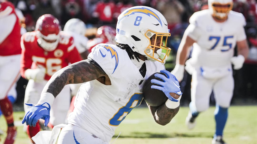 Dec 14, 2025; Kansas City, Missouri, USA; Los Angeles Chargers running back Omarion Hampton (8) runs for yards after the catch against the Kansas City Chiefs during the second quarter at GEHA Field at Arrowhead Stadium. Mandatory Credit: Denny Medley-Imagn Images