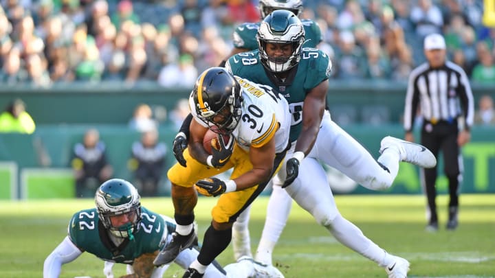 Oct 30, 2022; Philadelphia, Pennsylvania, USA; Pittsburgh Steelers running back Jaylen Warren (30) is tackled by Philadelphia Eagles safety Marcus Epps (22) and  linebacker Kyron Johnson (58)  during the fourth quarter at Lincoln Financial Field. Mandatory Credit: Eric Hartline-USA TODAY Sports