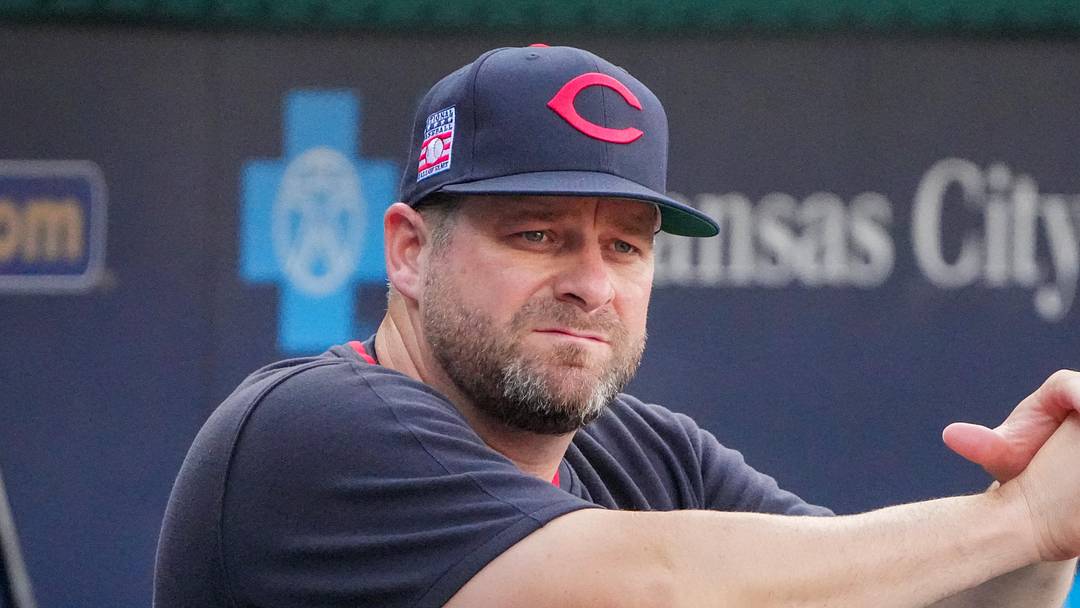 Jul 26, 2025; Kansas City, Missouri, USA; Cleveland Guardians manager Stephen Vogt (12) watches warm ups against the Kansas City Royals prior to a game at Kauffman Stadium. Mandatory Credit: Denny Medley-Imagn Images
