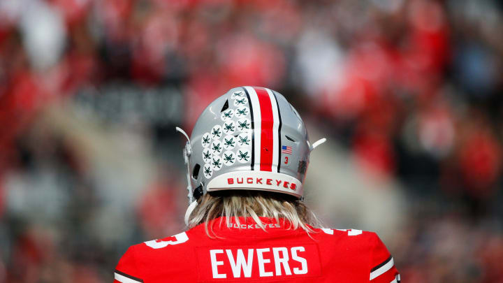 Sat., Nov. 20, 2021; Columbus, Ohio, USA; Ohio State Buckeyes quarterback Quinn Ewers (3) practices on the sideline during a break in play in the second quarter of a NCAA Division I football game between the Ohio State Buckeyes and the Michigan State Spartans at Ohio Stadium. Mandatory Credit: Joshua A. Bickel/Columbus Dispatch via USA TODAY Network.

Cfb Michigan State Spartans At Ohio State Buckeyes