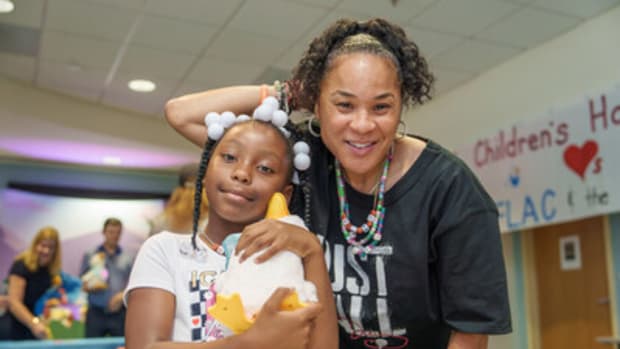Coach Dawn Staley partners with Aflac to give away  "My Special Aflac Duck" to cancer patients ages 3 and up