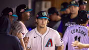 Arizona Diamondbacks pitching prospect Dylan Ray fist bumps teammates  in dugout after Arizona Fall League outing at Salt River Fields Oct 8. 2024