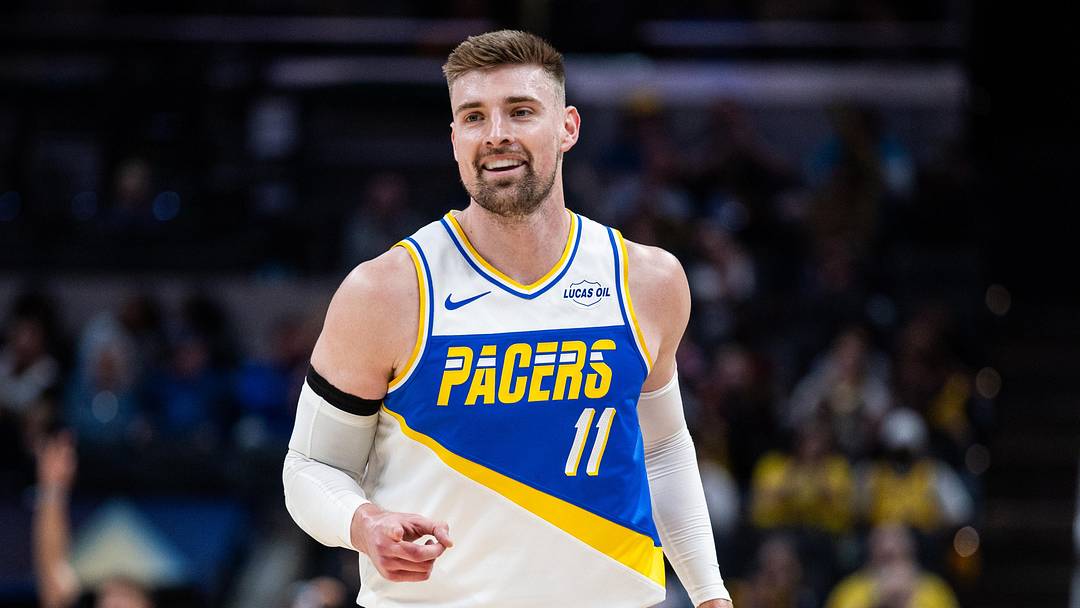 Mar 29, 2026; Indianapolis, Indiana, USA;  Indiana Pacers center Micah Potter (11) celebrates a made basket in the first half against the Miami Heat at Gainbridge Fieldhouse. Mandatory Credit: Trevor Ruszkowski-Imagn Images