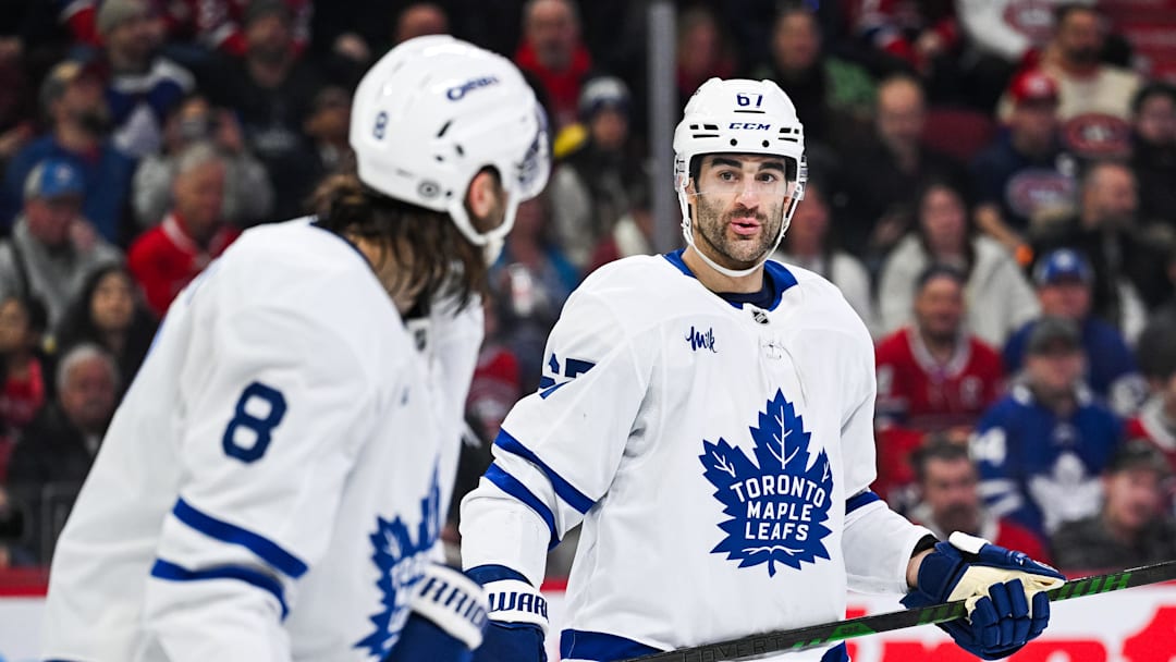 Jan 18, 2025; Montreal, Quebec, CAN; Toronto Maple Leafs left wing Max Pacioretty (67) has a discussion with defenseman Christopher Tanev (8) against the Montreal Canadiens during the second period at Bell Centre. Mandatory Credit: David Kirouac-Imagn Images