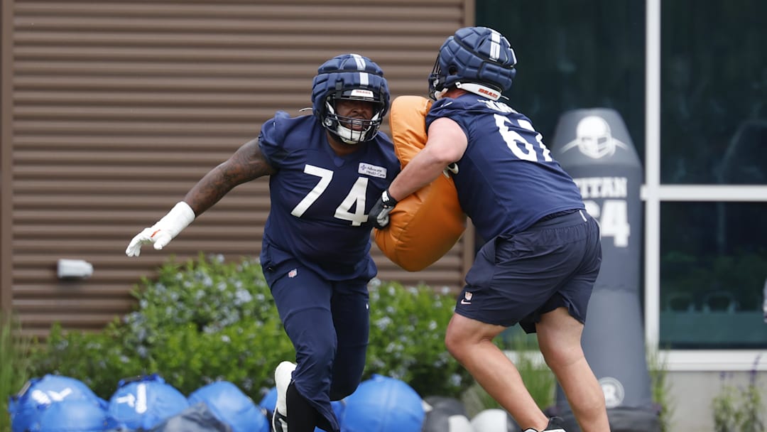 Jun 3, 2025; Lake Forest, IL, USA; Chicago Bears guard Jordan McFadden (74) warms up during minicamp at Halas Hall. Mandatory Credit: Kamil Krzaczynski-Imagn Images