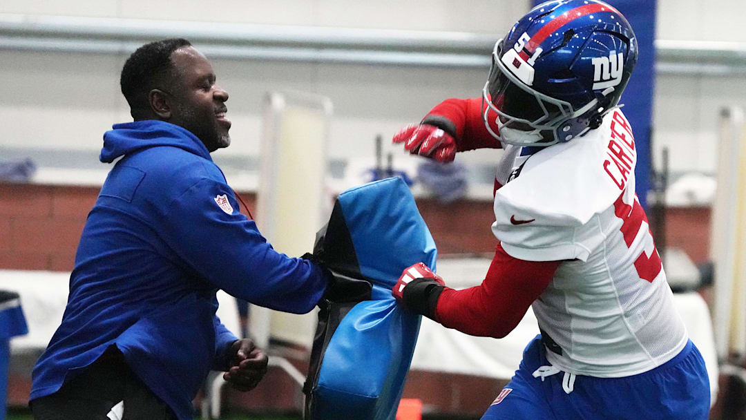 Eat Rutherford, NJ -- May 9, 2025 -- Inside linebacker coach John Egorugwu and Abdul Carter during practice at Giants Rookie Minicamp.