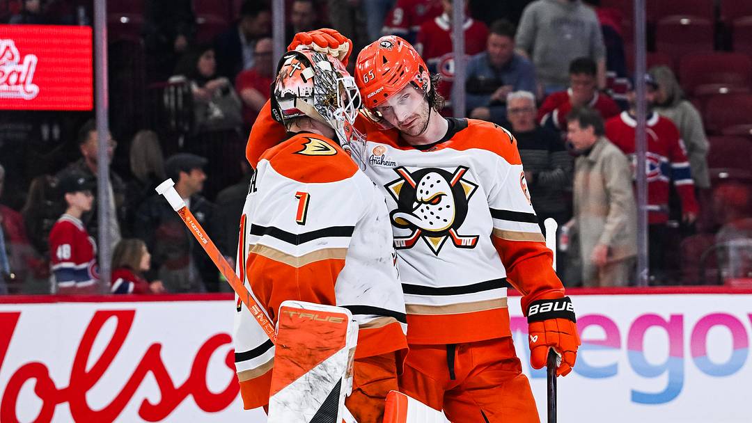 Mar 15, 2026; Montreal, Quebec, CAN; Anaheim Ducks defenseman Jacob Trouba (65) celebrates with goalie Lukas Dostal (1) the win against the Montreal Canadiens after the third period at Bell Centre. Mandatory Credit: David Kirouac-Imagn Images
