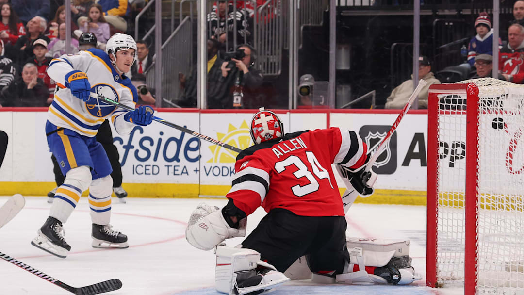Feb 25, 2026; Newark, New Jersey, USA; Buffalo Sabres center Peyton Krebs (19) scores a goal on New Jersey Devils goaltender Jake Allen (34) during the third period at Prudential Center. Mandatory Credit: Ed Mulholland-Imagn Images