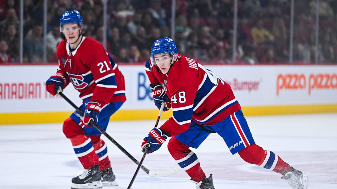 Oct 4, 2025; Montreal, Quebec, CAN; Montreal Canadiens defenseman Lane Hutson (48) plays the puck against the Ottawa Senators during the third period at Bell Centre. Mandatory Credit: David Kirouac-Imagn Images