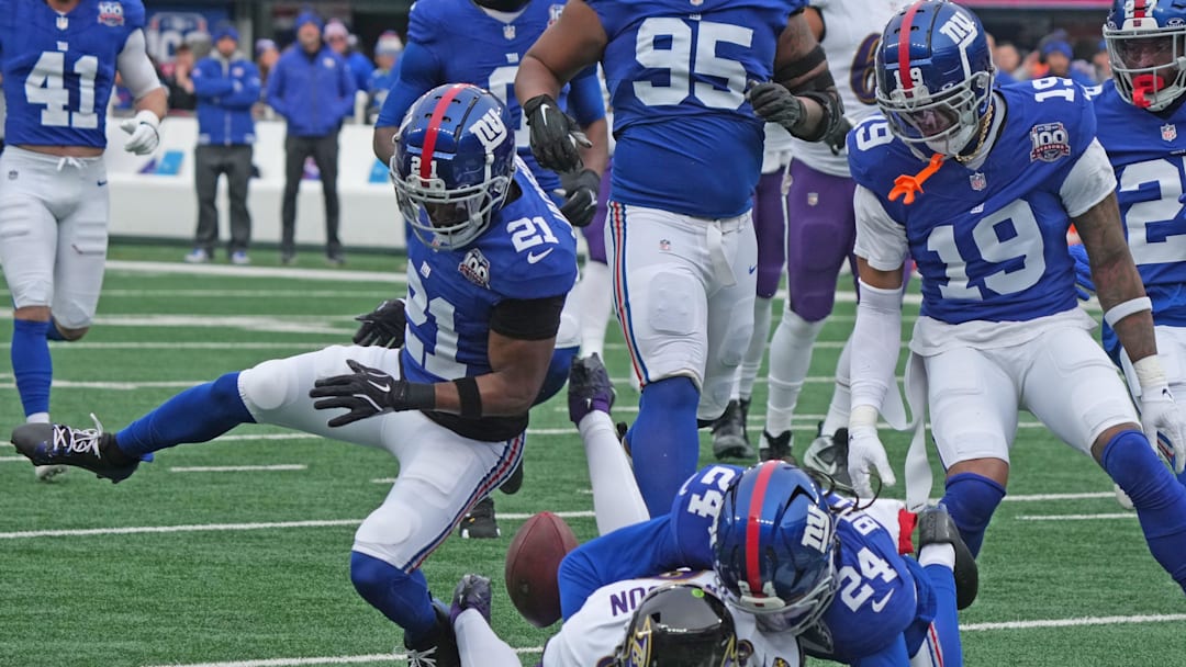 East Rutherford, NJ -- December 15, 2024 -- The Giants defense strips the ball from Lamar Jackson of the Ravens on the Raven's first drive of the game, causing a fumble the Giants recover. The Baltimore Ravens came to MetLife Stadium to play the New York Giants. East Rutherford, NJ -- December 15, 2024 -- The Giants defense strips the ball from Lamar Jackson of the Ravens on the Raven's first drive of the game, causing a fumble the Giants recover. The Baltimore Ravens came to MetLife Stadium to play the New York Giants.