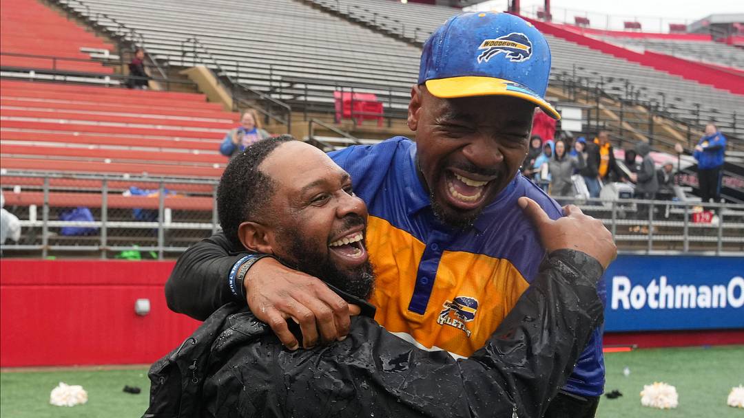 Woodbury head coach Anthony Reagan and assistant coach Jamal White (Right) at the end of the game as Woodbury defeated Mountain Lakes 31-7 to win the NJSIAA Group 1 Football Championship played in SHI Stadium at Rutgers in Piscataway, NJ on December 3, 2022. Woodbury head coach Anthony Reagan and assistant coach Jamal White (Right) at the end of the game as Woodbury defeated Mountain Lakes 31-7 to win the NJSIAA Group 1 Football Championship played in SHI Stadium at Rutgers in Piscataway, NJ on December 3, 2022.