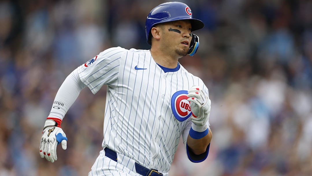 Apr 18, 2025; Chicago, Illinois, USA; Chicago Cubs designated hitter Seiya Suzuki (27) rounds the bases after hitting a solo home run against the Arizona Diamondbacks during the eight inning at Wrigley Field. Mandatory Credit: Kamil Krzaczynski-Imagn Images