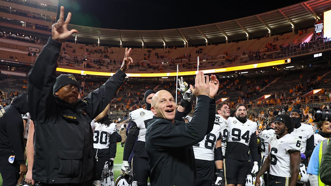 Nov 29, 2025; Knoxville, Tennessee, USA;  Vanderbilt Commodores head coach Clark Lea celebrates with his team after a game against the Tennessee Volunteers at Neyland Stadium. Mandatory Credit: Randy Sartin-Imagn Images