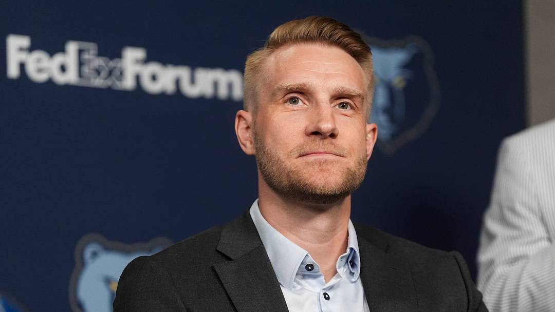 Tuomas Iisalo, Grizzlies head coach, smiles as he answers a question from the media during the introductory press conference for the team’s 2026 draft picks at FedExForum in Memphis, Tenn., on June 25, 2026.