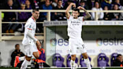 Christian Pulisic of AC Milan celebrates with Alvaro Morata...