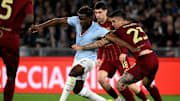 Fisayo Dele-Bashiru of SS Lazio and Gianluca Mancini of AS...