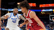 Memphis' Dain Dainja (42) guards Temple's Elijah Gray (22) as he drives to the basket during the game between Temple University and the University of Memphis at FedExForum in Memphis, Tenn., on Sunday, February 9, 2025.