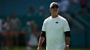 Oct 15, 2023; Miami Gardens, Florida, USA; Carolina Panthers head coach Frank Reich walks on the field prior to the game against the Miami Dophins at Hard Rock Stadium. Mandatory Credit: Jasen Vinlove-Imagn Images
